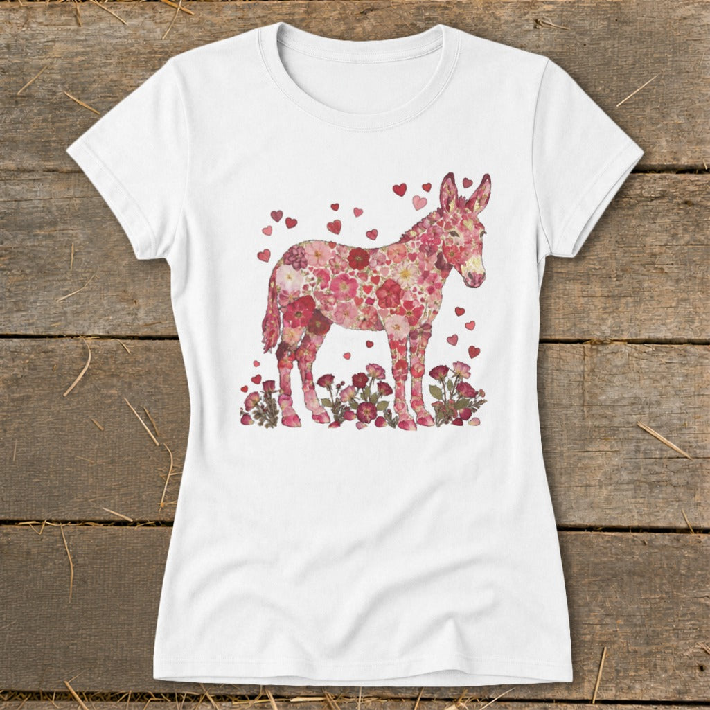 White t-shirt with a floral donkey graphic surrounded by hearts and flowers.