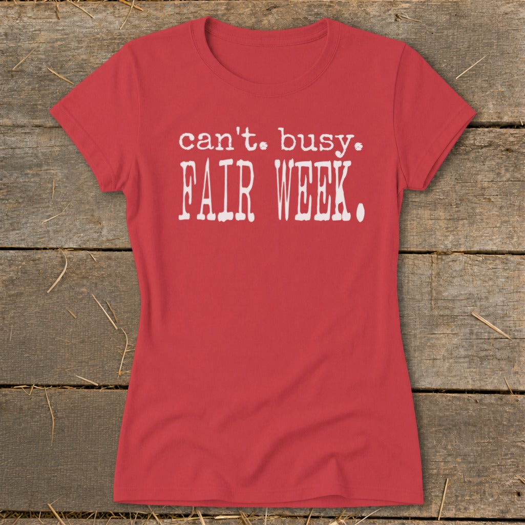 Red t-shirt with white text that reads "can't. busy. FAIR WEEK."