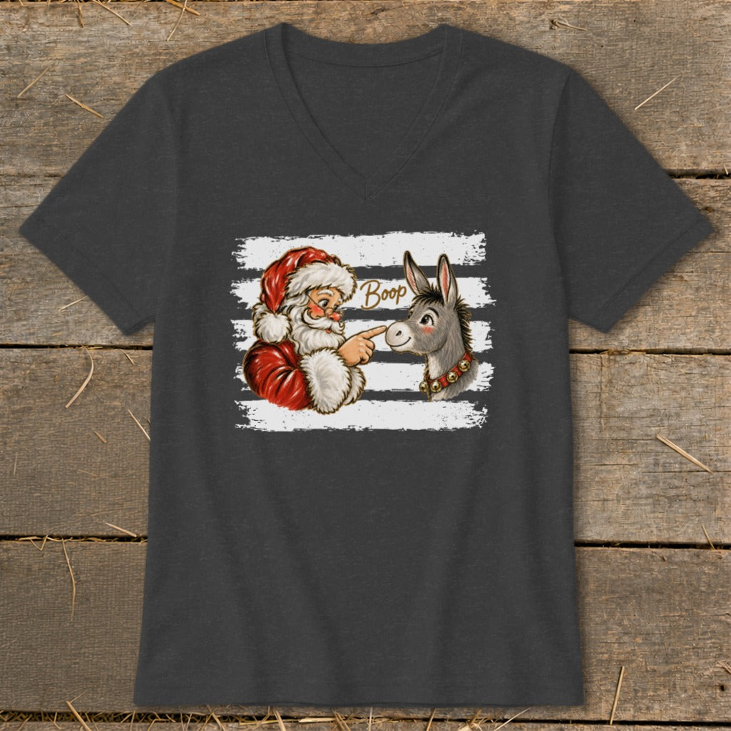 Santa boops a donkey on the nose with the word "Boop" above them.