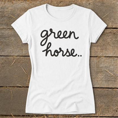 White t-shirt with black cursive text "green horse.."