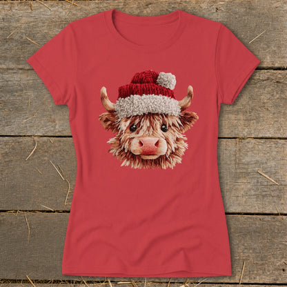 Red t-shirt with a fluffy highland cow wearing a Santa hat.