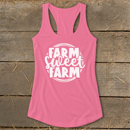 Pink racerback tank top with white "Farm Sweet Farm" text inside a circle.