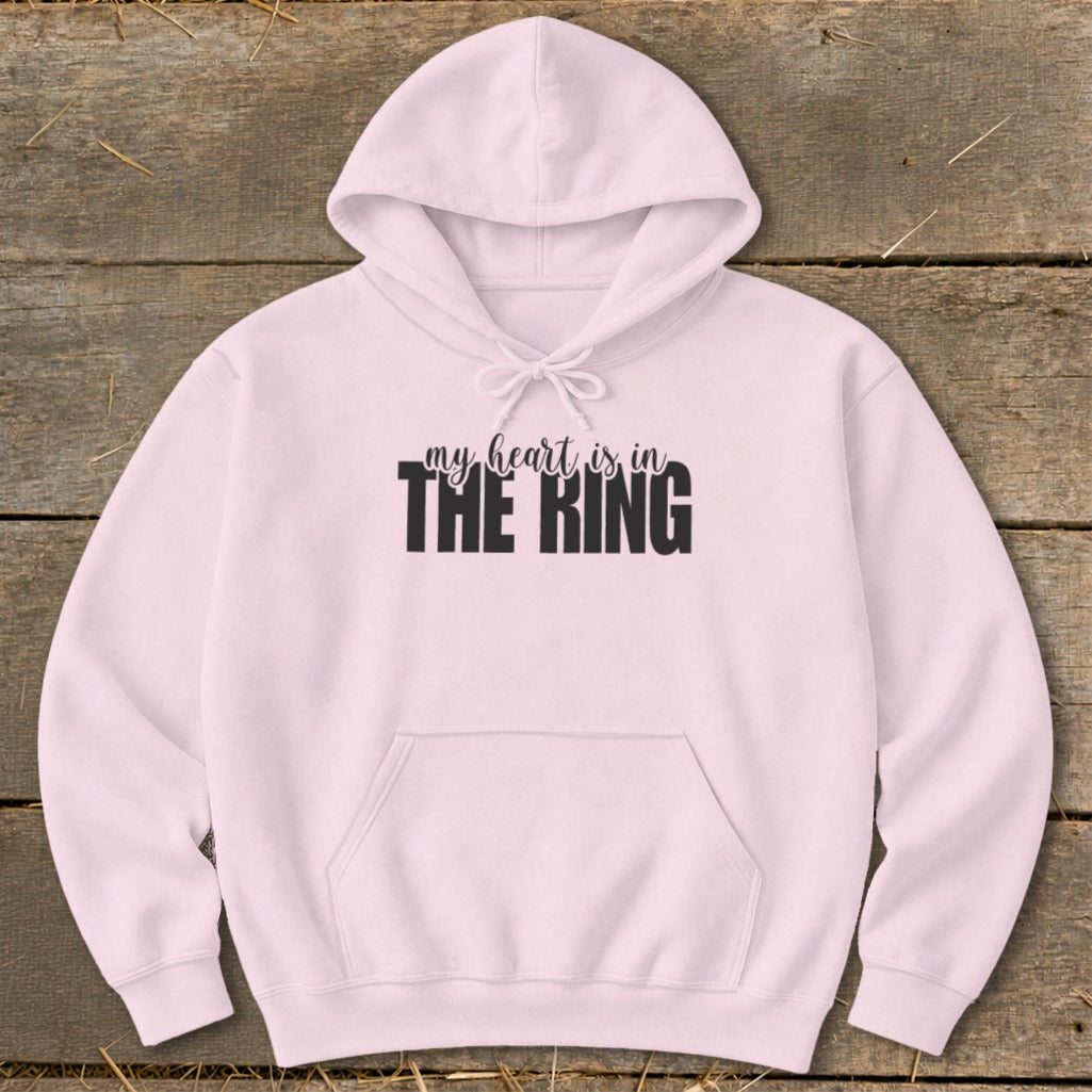 Pink hoodie with "my heart is in THE RING" graphic on chest.