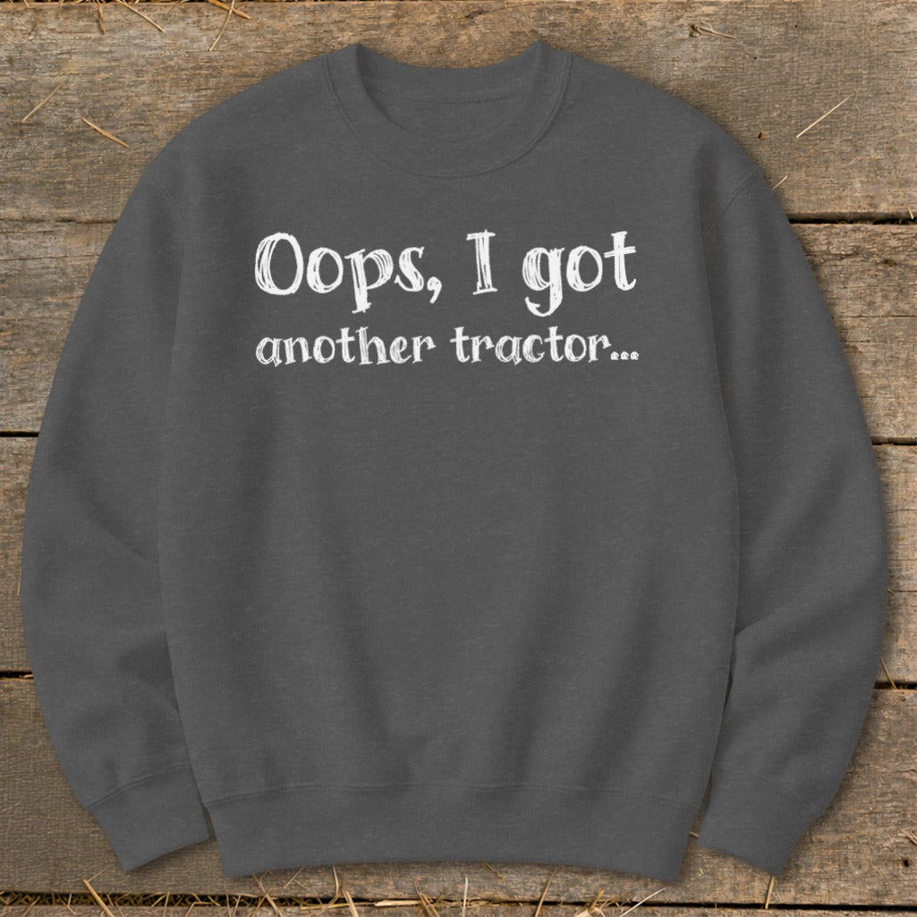 Grey sweatshirt with white text "Oops, I got another tractor..."