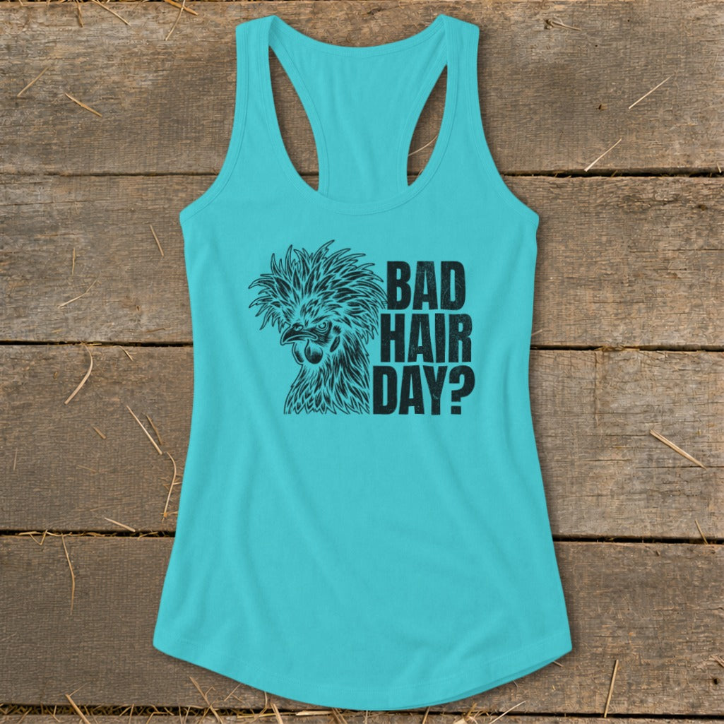 Turquoise tank top with a black graphic of a chicken with a messy crest and the text "BAD HAIR DAY?".