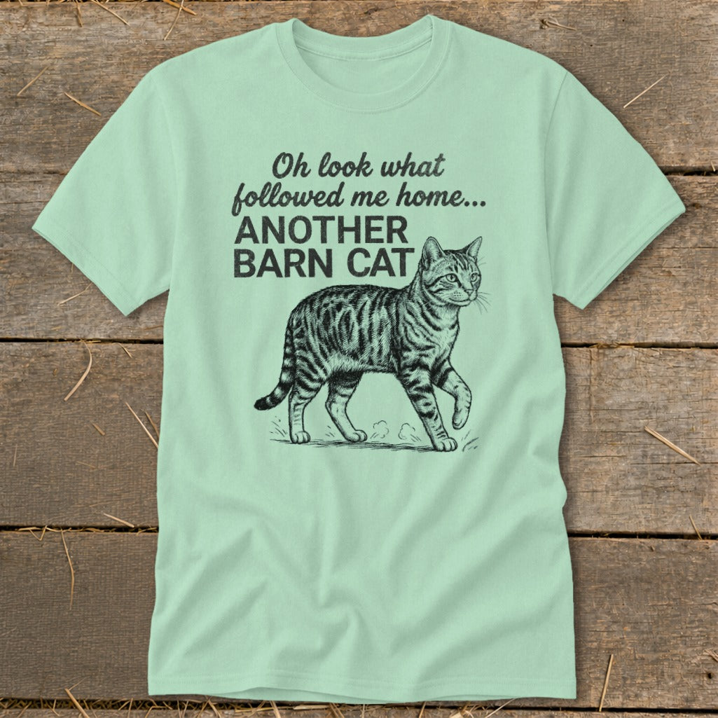 Light green t-shirt with "Oh look what followed me home... ANOTHER BARN CAT" and a cat graphic.
