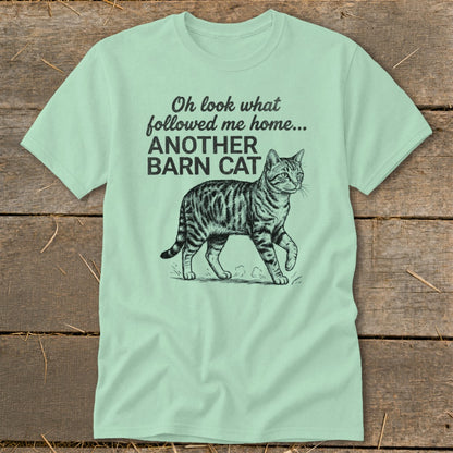 Light green t-shirt with "Oh look what followed me home... ANOTHER BARN CAT" and a cat graphic.