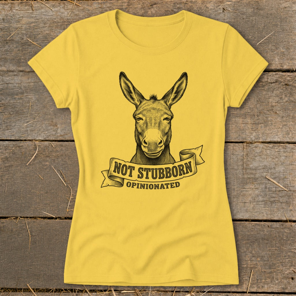 Yellow t-shirt with a donkey illustration and text "NOT STUBBORN OPINIONATED".