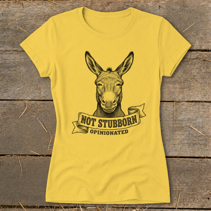 Yellow t-shirt with a donkey illustration and text "NOT STUBBORN OPINIONATED".