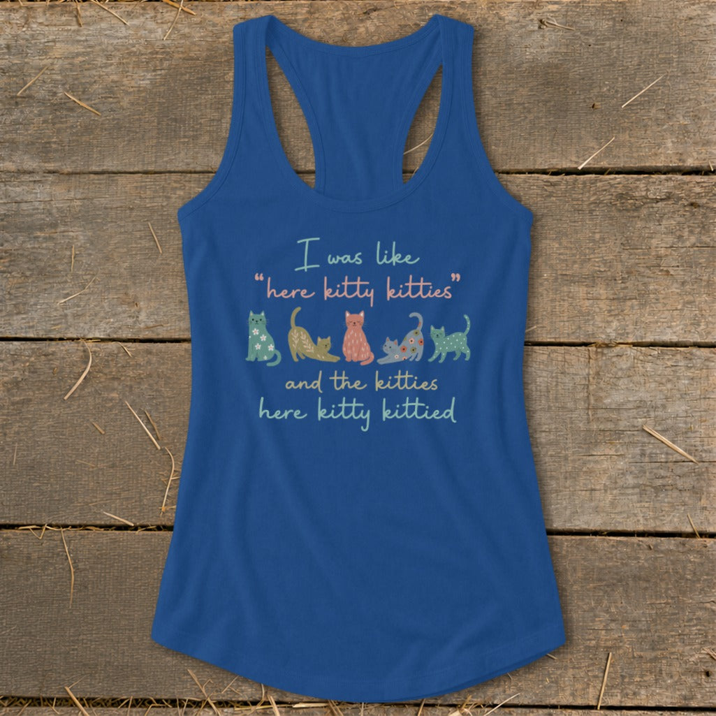 Blue tank top with "I was like 'here kitty kitties' and the kitties here kitty kittied" text and cat illustrations.