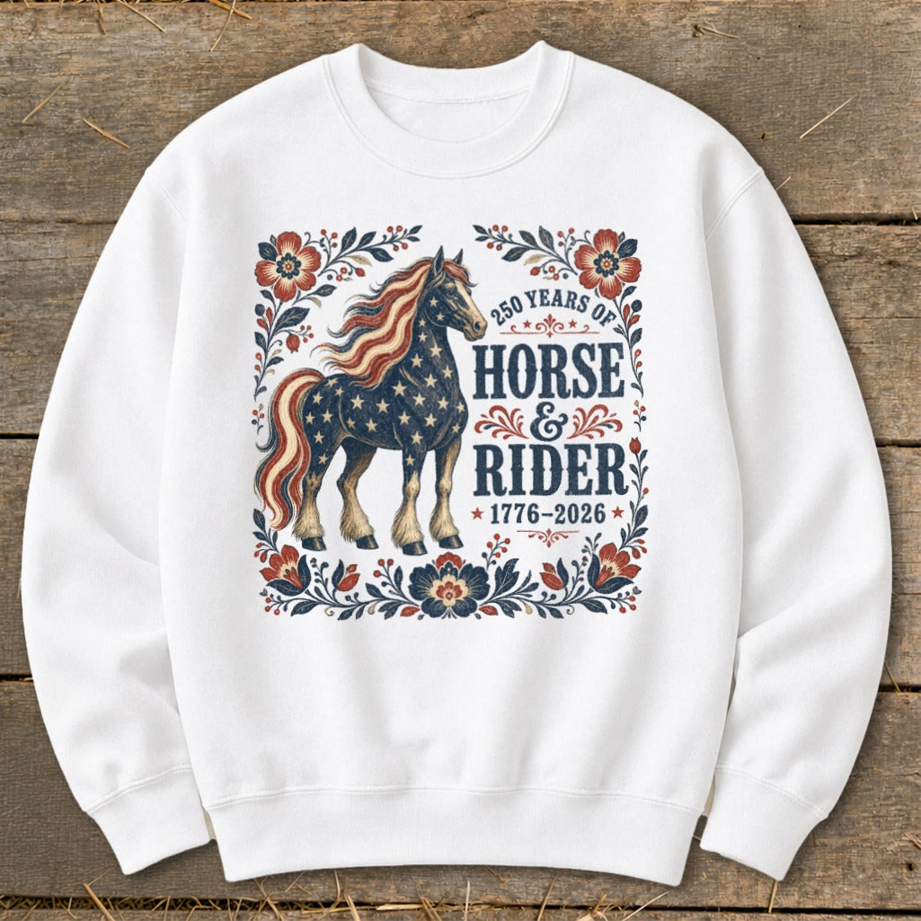 White sweatshirt with patriotic horse and "250 Years of Horse & Rider 1776-2026" text.