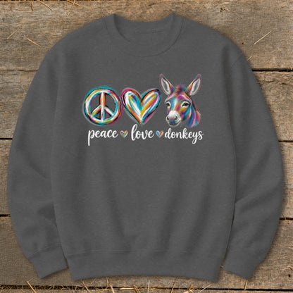 Peace love donkeys graphic on a grey sweatshirt with colorful peace sign, heart, and donkey.