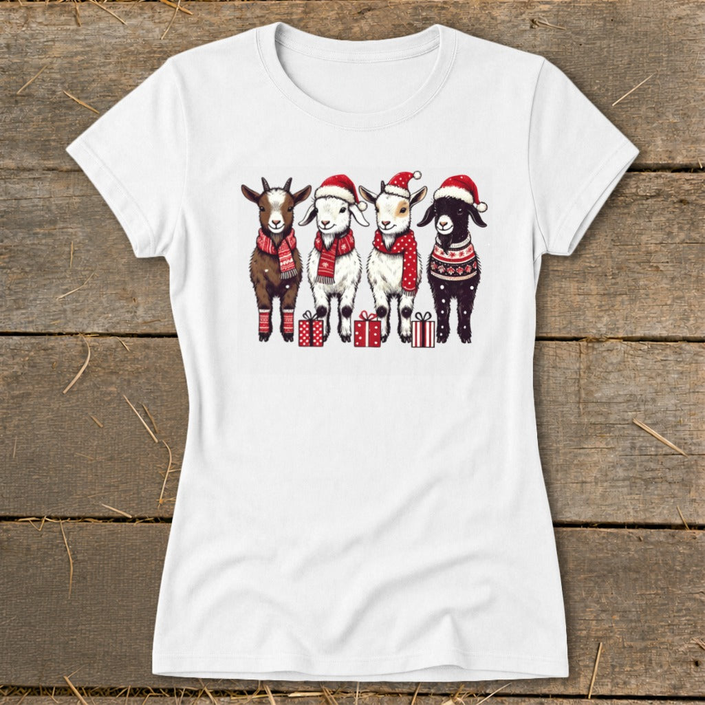 Four festive goats wearing Santa hats and scarves stand with gifts.