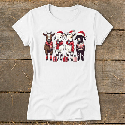 Four festive goats wearing Santa hats and scarves stand with gifts.