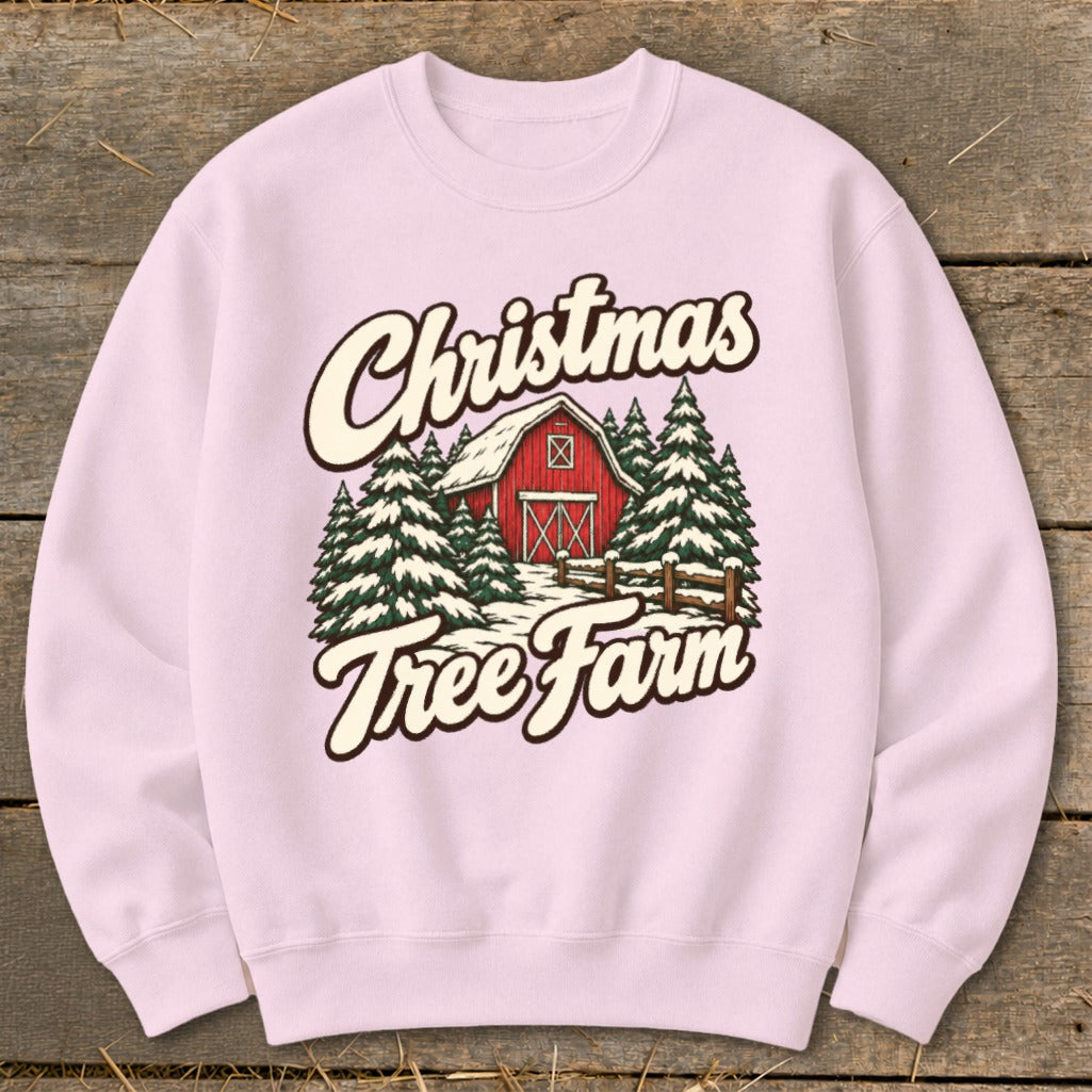 Light pink sweatshirt with a vintage Christmas Tree Farm graphic.