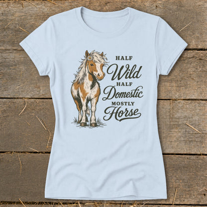 Light blue t-shirt with a drawing of a horse and text "Half Wild Half Domestic Mostly Horse".