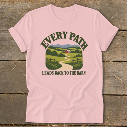 Pink t-shirt with farm landscape graphic and text "Every Path Leads Back To The Barn."