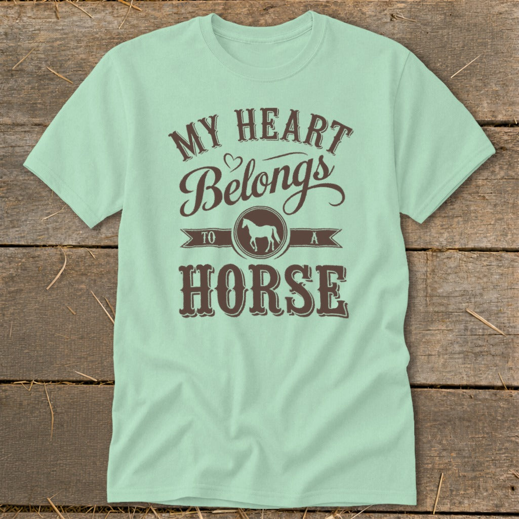 Light blue t-shirt with "My Heart Belongs to a Horse" text and horse silhouette.