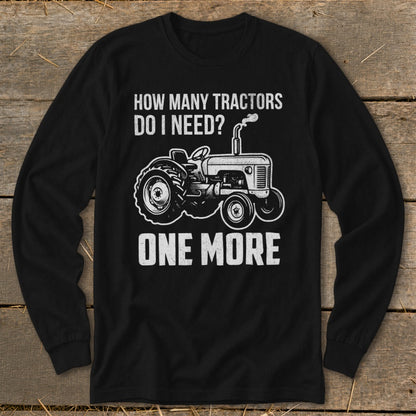 Black long-sleeve shirt with tractor graphic and text: "HOW MANY TRACTORS DO I NEED? ONE MORE"