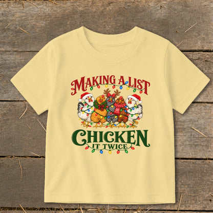 T-shirt with chickens in Santa hats and Christmas lights, reads "Making a list, chicken it twice."