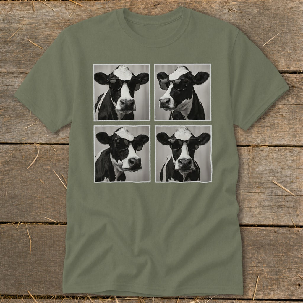 Four black and white cow portraits wearing sunglasses arranged in a grid on a t-shirt.