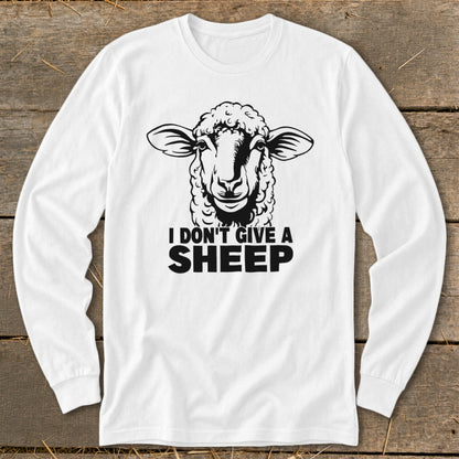White long-sleeve shirt with a black graphic of a sheep's head and "I DON'T GIVE A SHEEP" text.