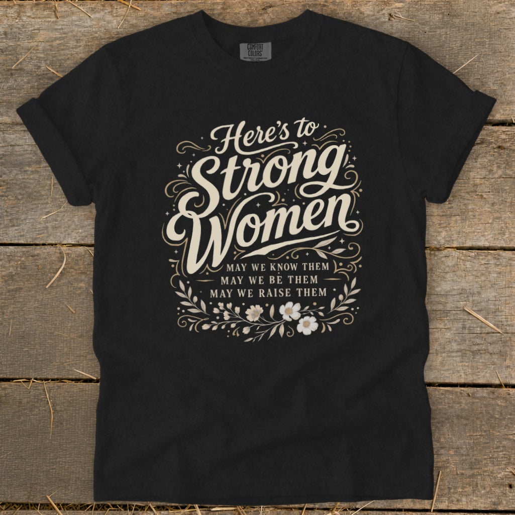Black t-shirt with "Here's to Strong Women" and floral design.