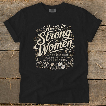 Black t-shirt with "Here's to Strong Women" and floral design.