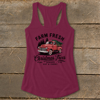 Maroon tank top with "Farm Fresh Christmas Trees" text and vintage red truck graphic.