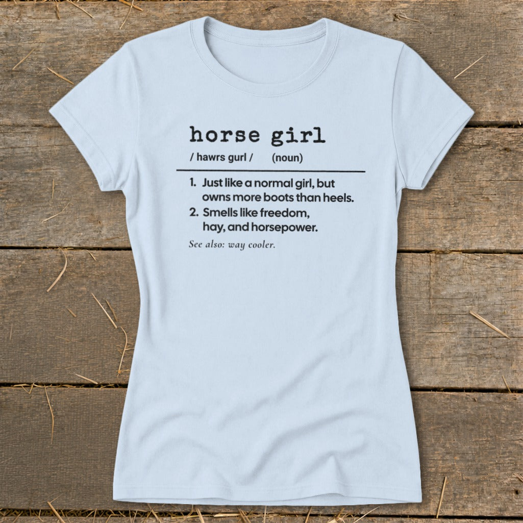 Light blue t-shirt with "horse girl" definition, listing boots, freedom, hay, and horsepower.