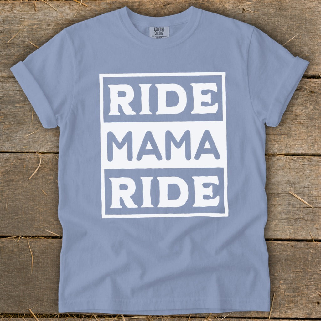 Periwinkle t-shirt with white text "RIDE MAMA RIDE" in stacked boxes.