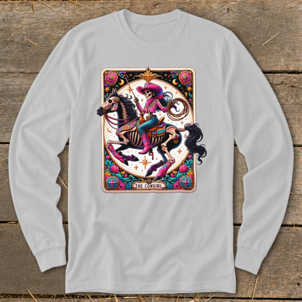 Skeleton cowgirl in pink hat and boots riding a horse with lasso, text "The Cowgirl".