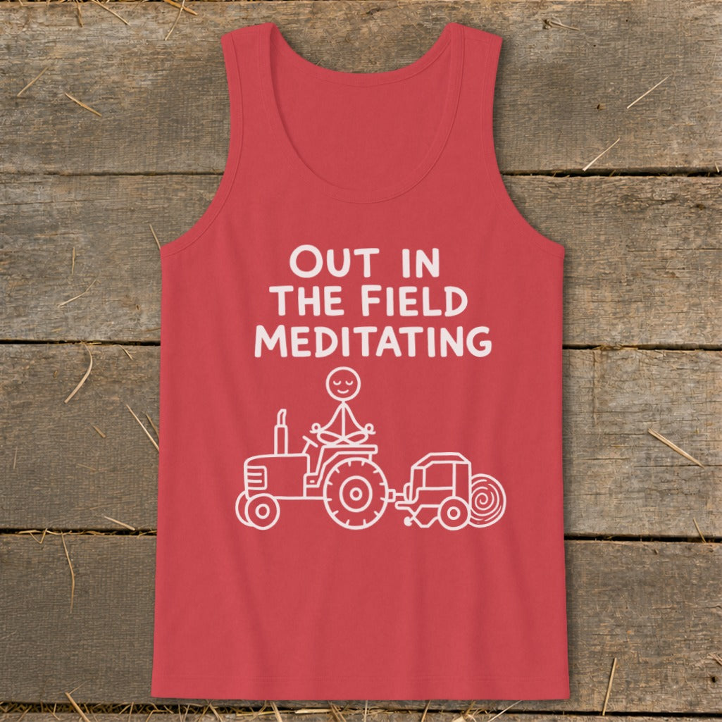 Red tank top with white text and illustration of meditating figure on a tractor.