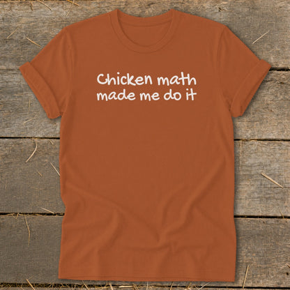 Orange t-shirt with white text that reads "Chicken math made me do it."