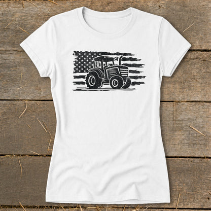 White t-shirt with a distressed tractor and American flag graphic.