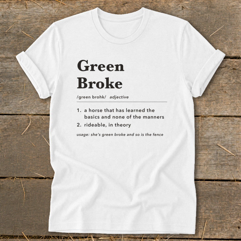 A white t-shirt with black text defining the term green broke centered on the chest.