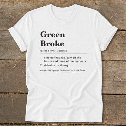 A white t-shirt with black text defining the term green broke centered on the chest.