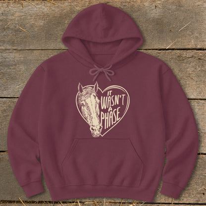 Maroon hoodie with a heart graphic featuring a horse and text "It Wasn't A Phase."