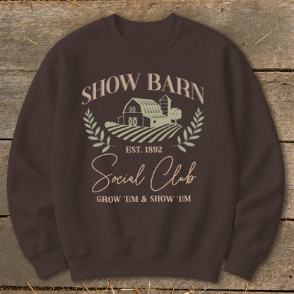 Show Barn Social Club graphic with barn and fields, est. 1892.
