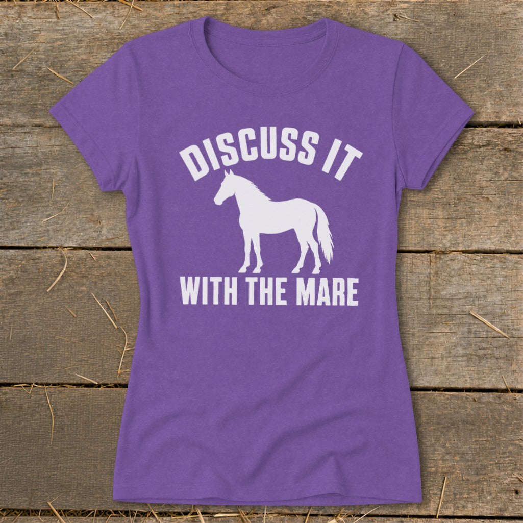 Purple t-shirt with white text "DISCUSS IT WITH THE MARE" and a horse silhouette.