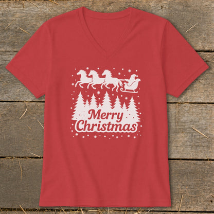 Red t-shirt with white graphic of horses pulling Santa's sleigh over trees and "Merry Christmas."