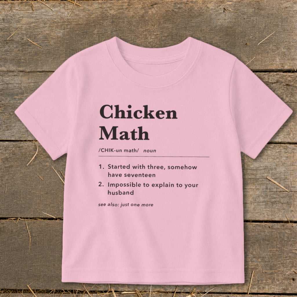 Pink t-shirt with "Chicken Math" definition including how to pronounce and a humorous explanation.