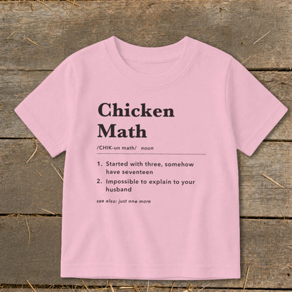 Pink t-shirt with "Chicken Math" definition including how to pronounce and a humorous explanation.
