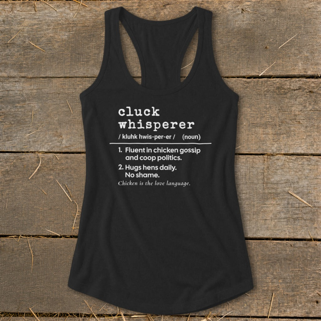 Black tank top with "Cluck Whisperer" definition: fluent in chicken gossip and coop politics.
