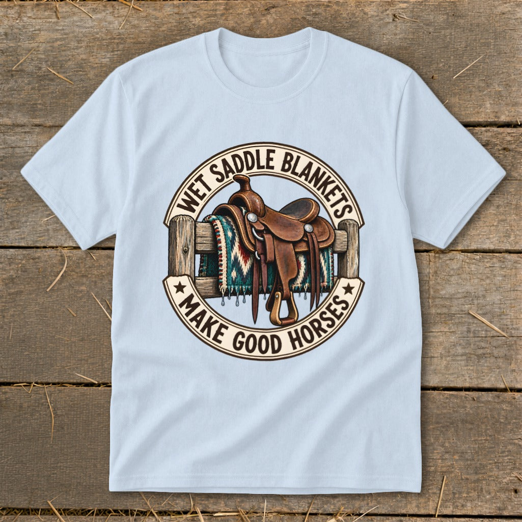 Light blue t-shirt with graphic of a saddle and blanket on a fence.