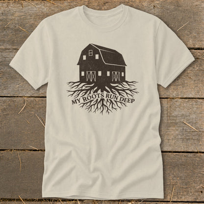 Light cream t-shirt with dark brown barn and roots graphic. "MY ROOTS RUN DEEP" text.