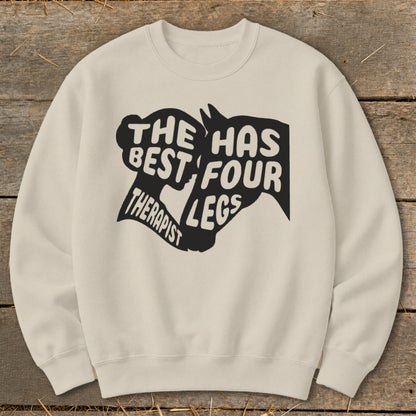 Cream sweatshirt with black graphic of horse head and text, "The best therapist has four legs."