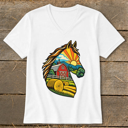 A white V-neck t-shirt featuring a graphic of a horse head silhouette filled with a farm scene containing a red barn, hay bales, and a sunrise.