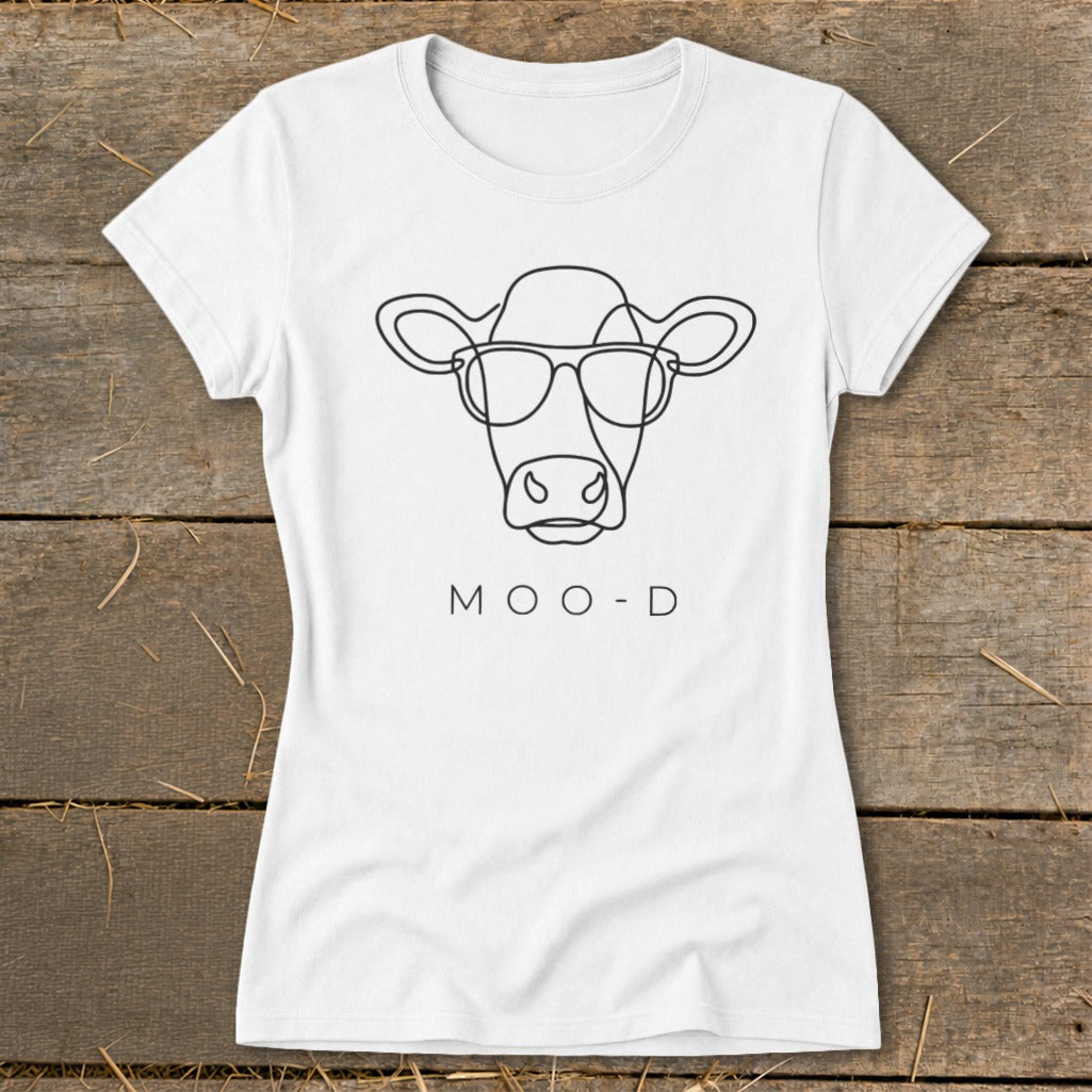White t-shirt with line art cow wearing sunglasses and text "MOO-D".