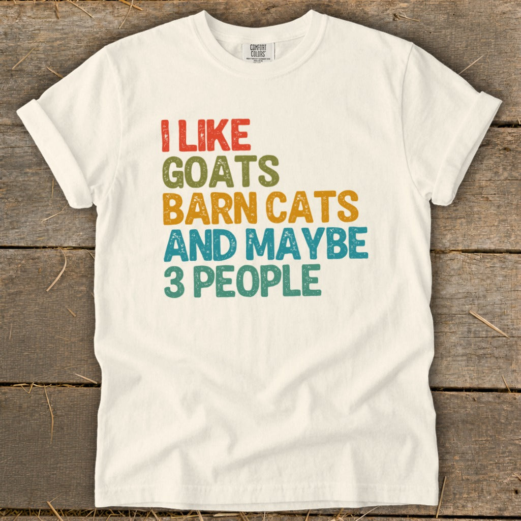 White t-shirt with text "I LIKE GOATS BARN CATS AND MAYBE 3 PEOPLE".